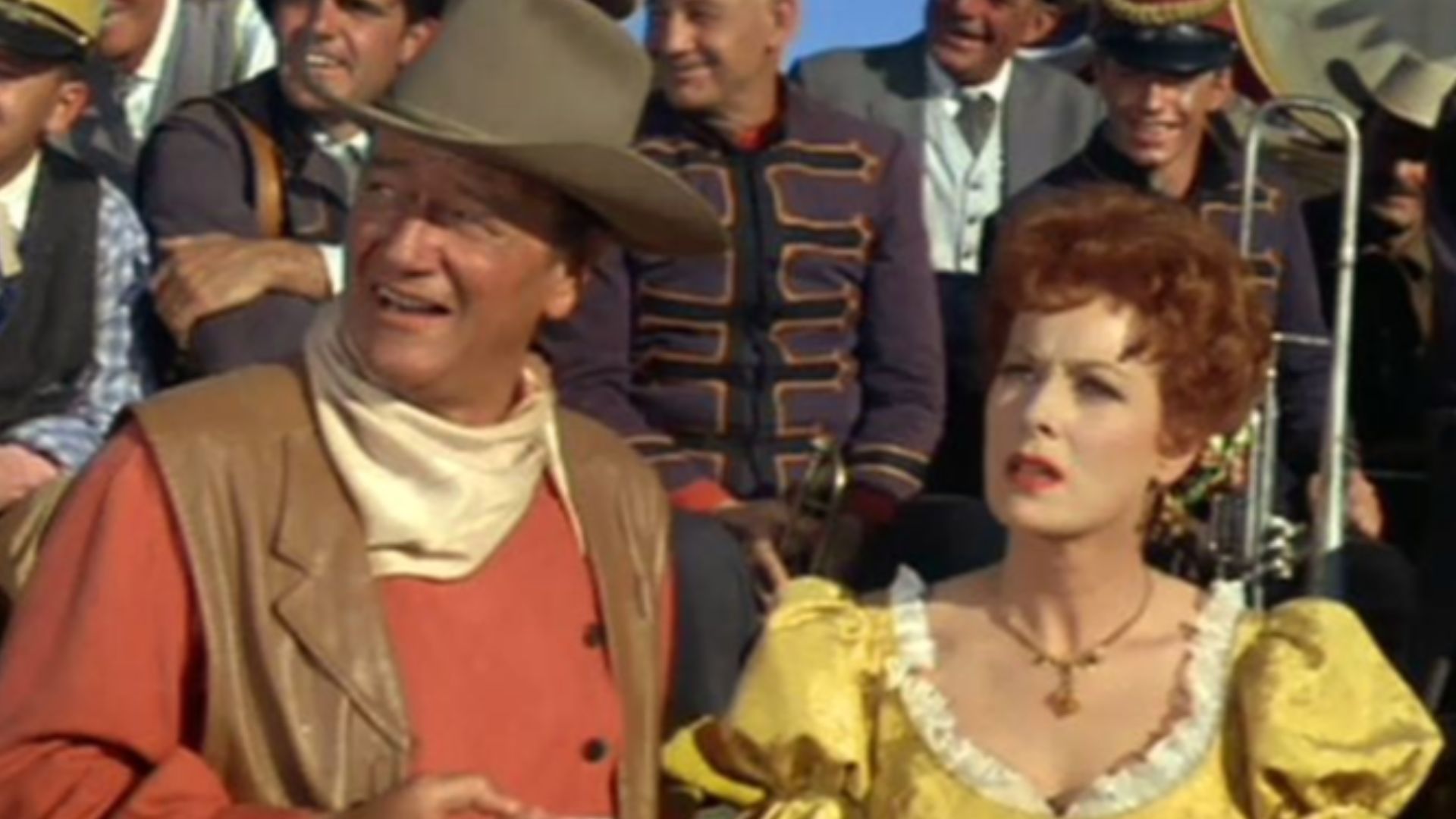 L. to R. : Jack Kruschen, John Wayne, Maureen O'Hara & Chill Wills in McLintock! (cropped screenshot)