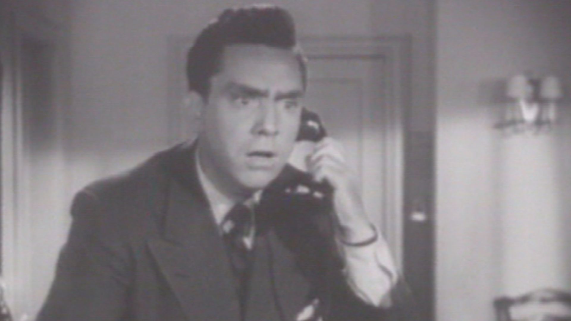 Cropped screenshot of Edmond O'Brien from the film D.O.A. (1950).