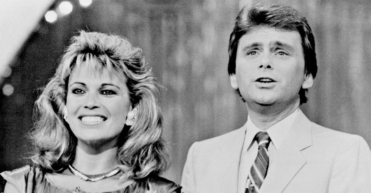 Photograph of Pat Sajak and Vanna White in a promo photo for the 86-87 season of Wheel of Fortune. This photo was sent out to fans by mail with signatures from the cast.