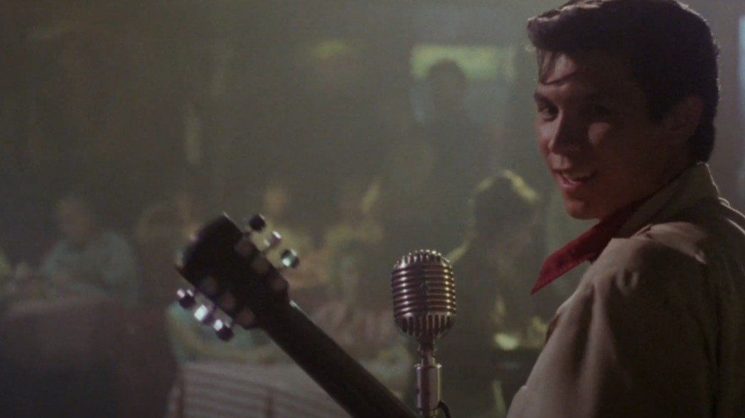 Lou Diamond Phillips as Ritchie Valens in La Bamba performing