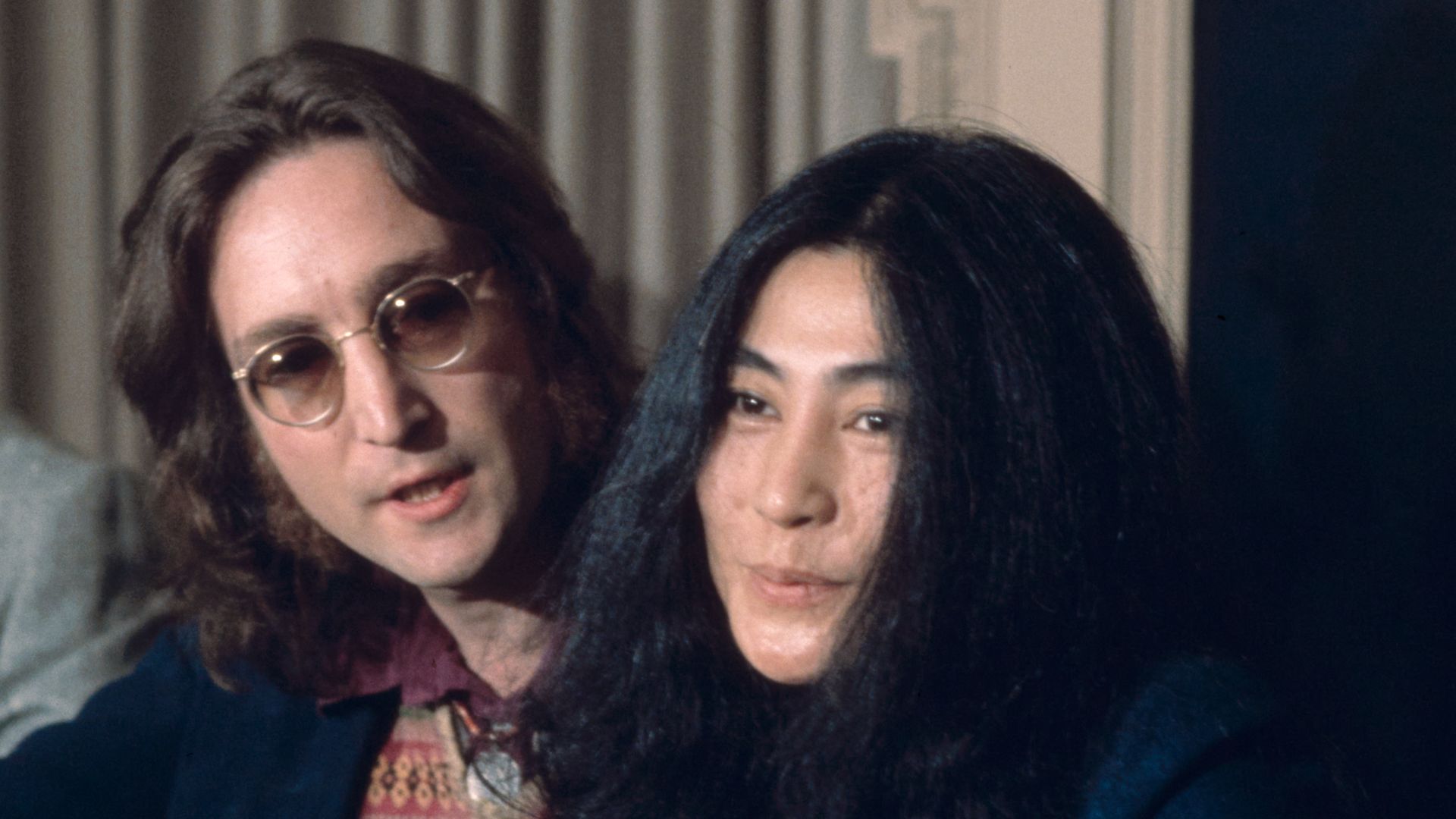 John Lennon and Yoko Ono at a New York press conference on April 2nd, 1973 where they would announce the conceptual country of Nutopia.