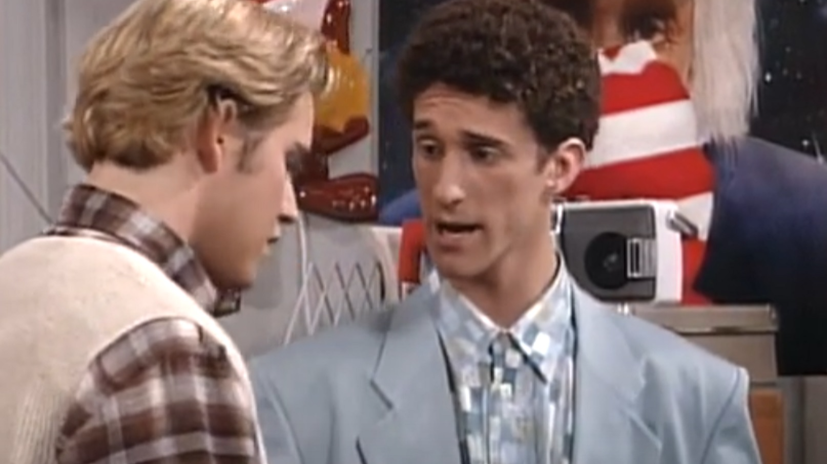 Screenshot: Dustin Diamond is talking with other male  - from Saved by the Bell: The College Years (1993-1994)