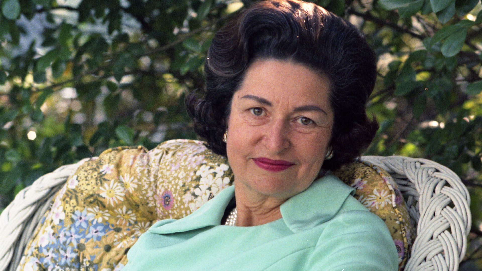 CTJ seated, aqua-colored dress