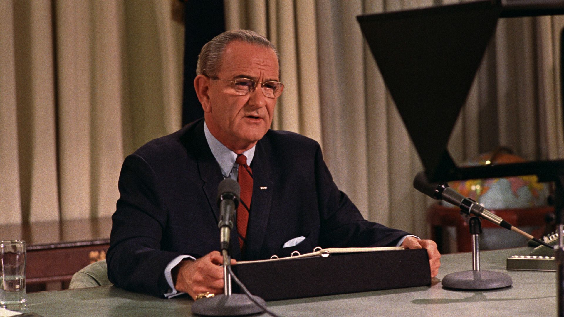 Lyndon B. Johnson speaks to nation on TV on March 31, 1968, announcing a bombing halt in Vietnam and his intention not to run for re-election.