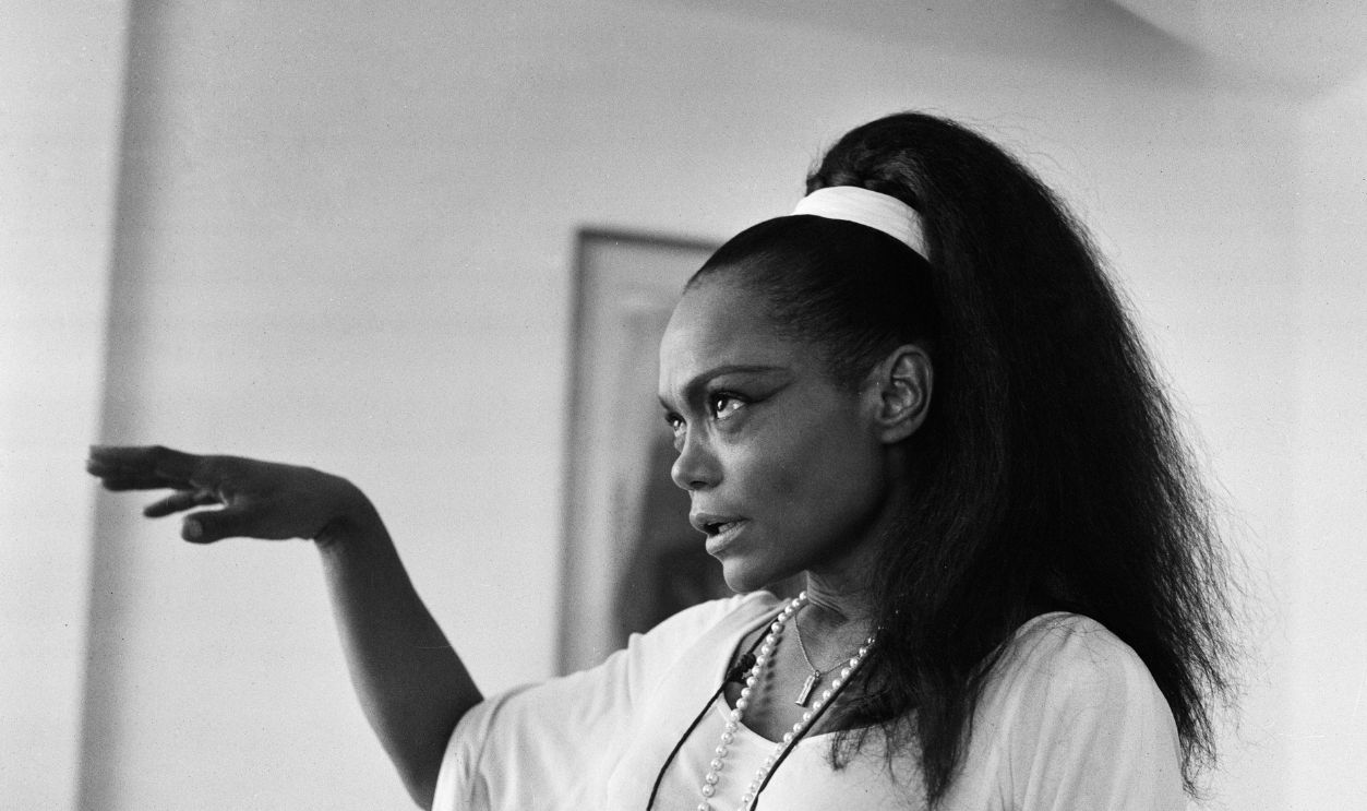 American actress and singer Eartha Kitt who is booked to appear in club cabaret in the Yorkshire town of Batley, pictured in her hotel room at the Carlton Tower in London. 10th October 1968.