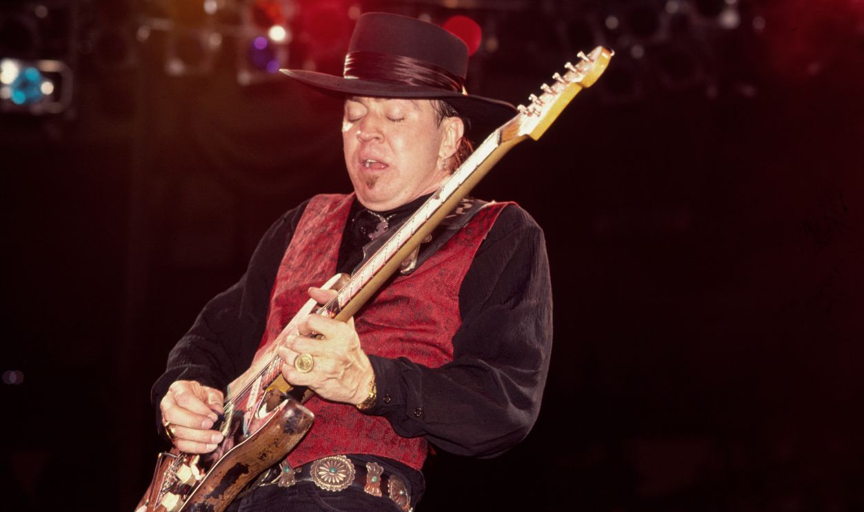 American Blues & Rock musician Stevie Ray Vaughan (1956 - 1990) plays guitar as he performs (with his band Double Trouble) during the 'In Step' tour, onstage at Madison Square Garden, November 11, 1989.