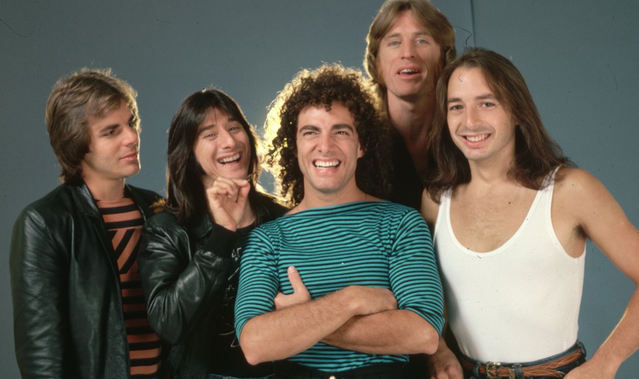 Jonathan Cain, Steve Perry, Neal Schon, Ross Valory, and Steve Smith (l to r) of the rock band Journey pose for a picture.