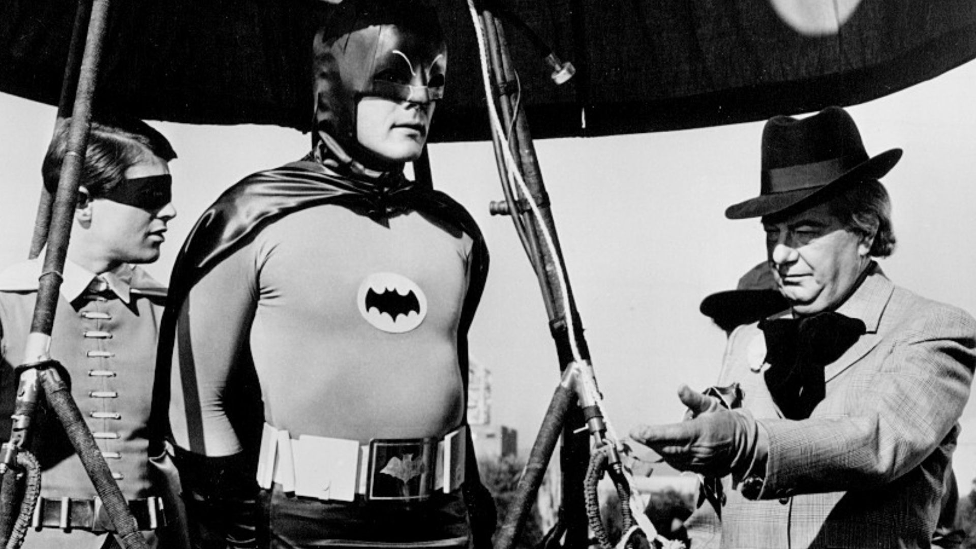 Photo of Burt Ward as Robin, Adam West as Batman and Maurice Evans as The Puzzler from the television series Batman.  This episode is