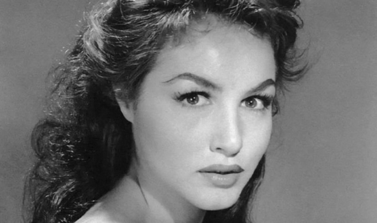Julie Newmar bare-shouldered portrait circa 1958.