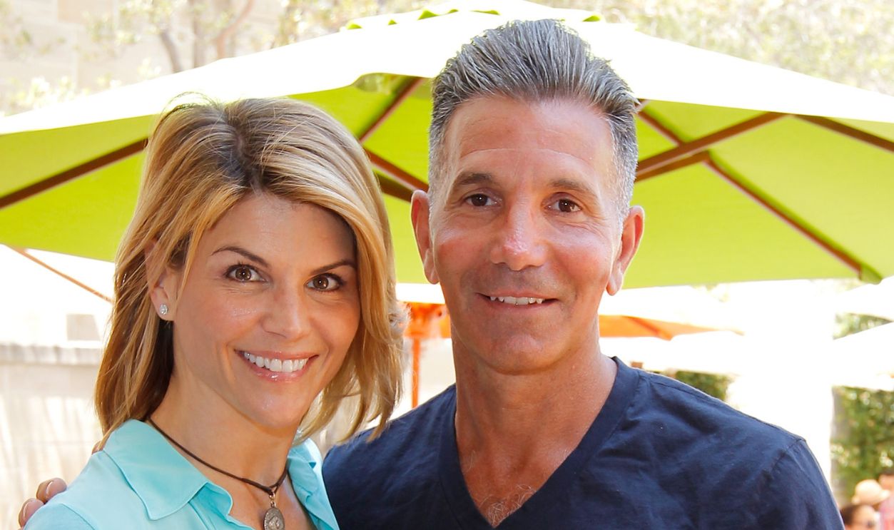BEVERLY HILLS, CA - JUNE 03: Lori Loughlin and Mossimo Giannulli attend 6th Annual Kidstock Music And Arts Festival Sponsored By Hudson Jeans at Greystone Mansion on June 3, 2012 in Beverly Hills, California.