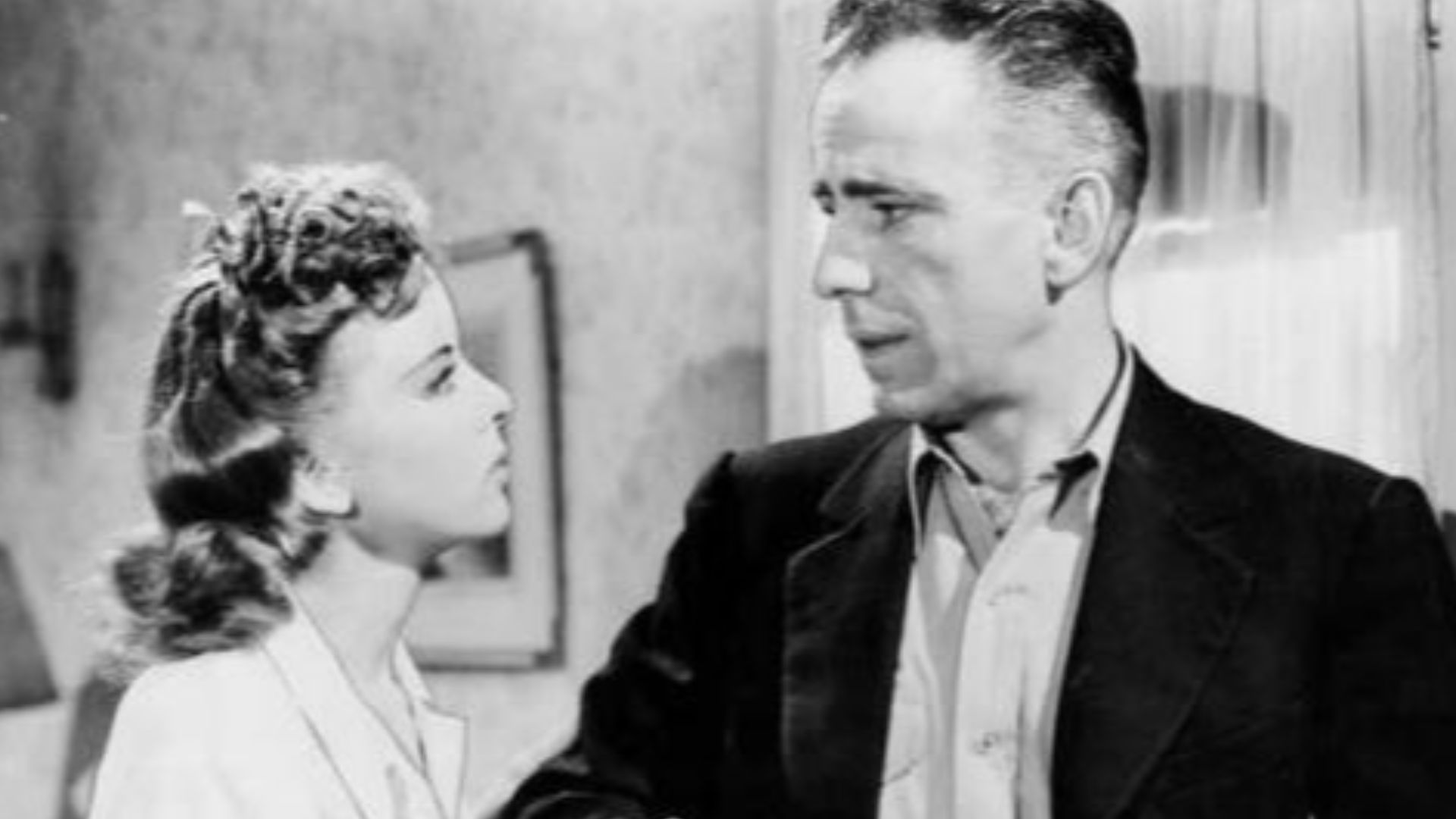 Ida Lupino & Humphrey Bogart in American gangster heist noir film High Sierra (1941). See also film still. No copyright notice.