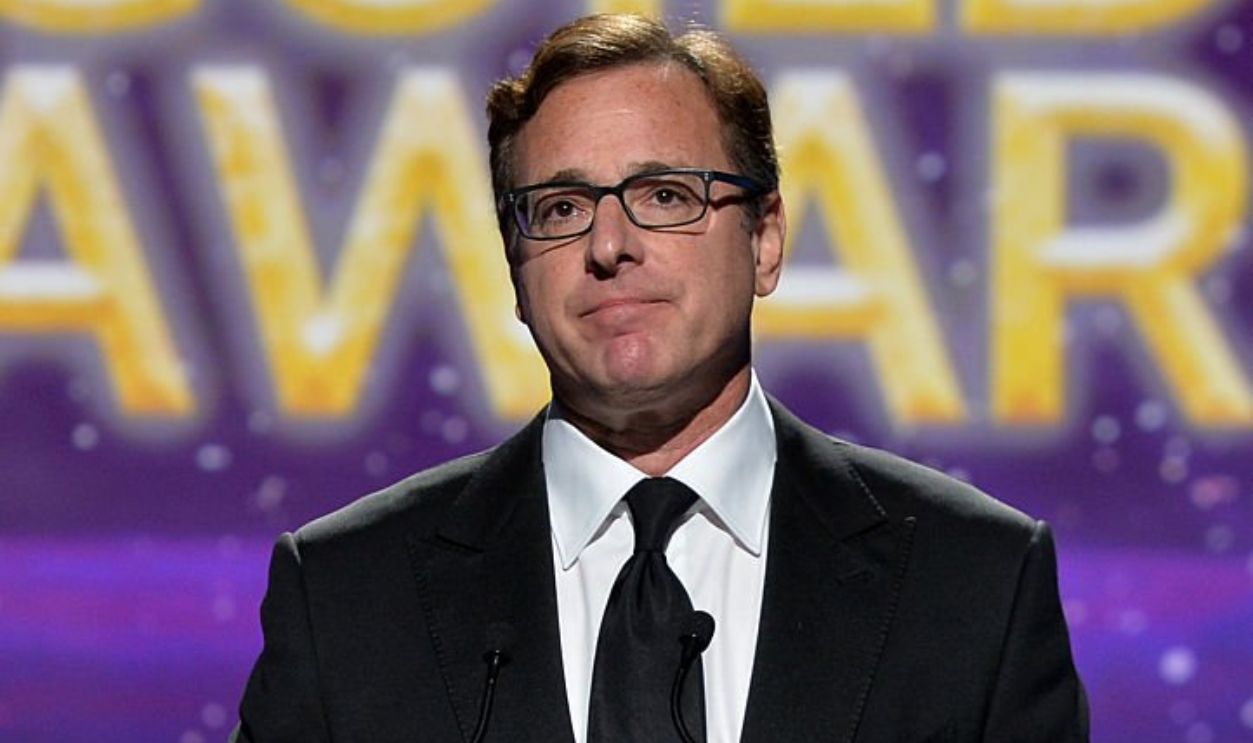 CENTURY CITY, CA - FEBRUARY 14: Actor Bob Saget speaks onstage at the 2015 Writers Guild Awards L.A. Ceremony at the Hyatt Regency Century Plaza on February 14, 2015 in Century City, California. 
