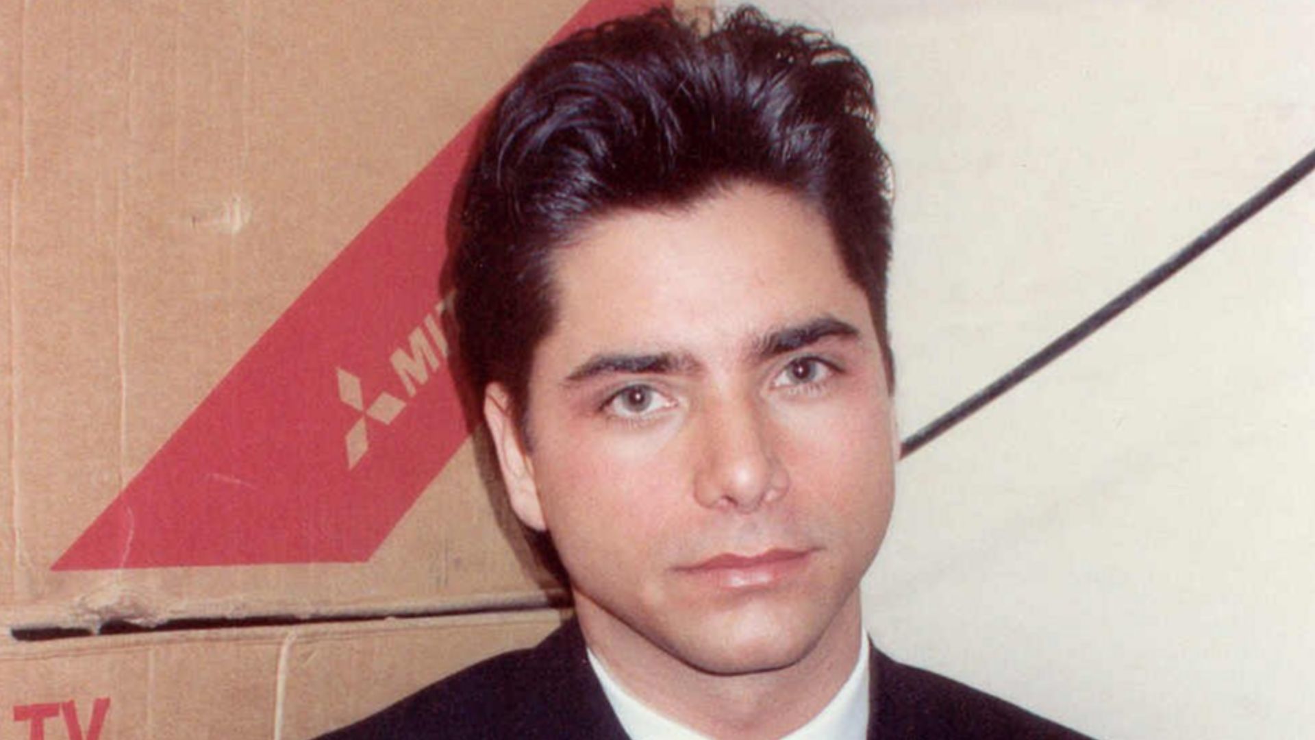 John Stamos backstage at the 1990 Grammy Awards.