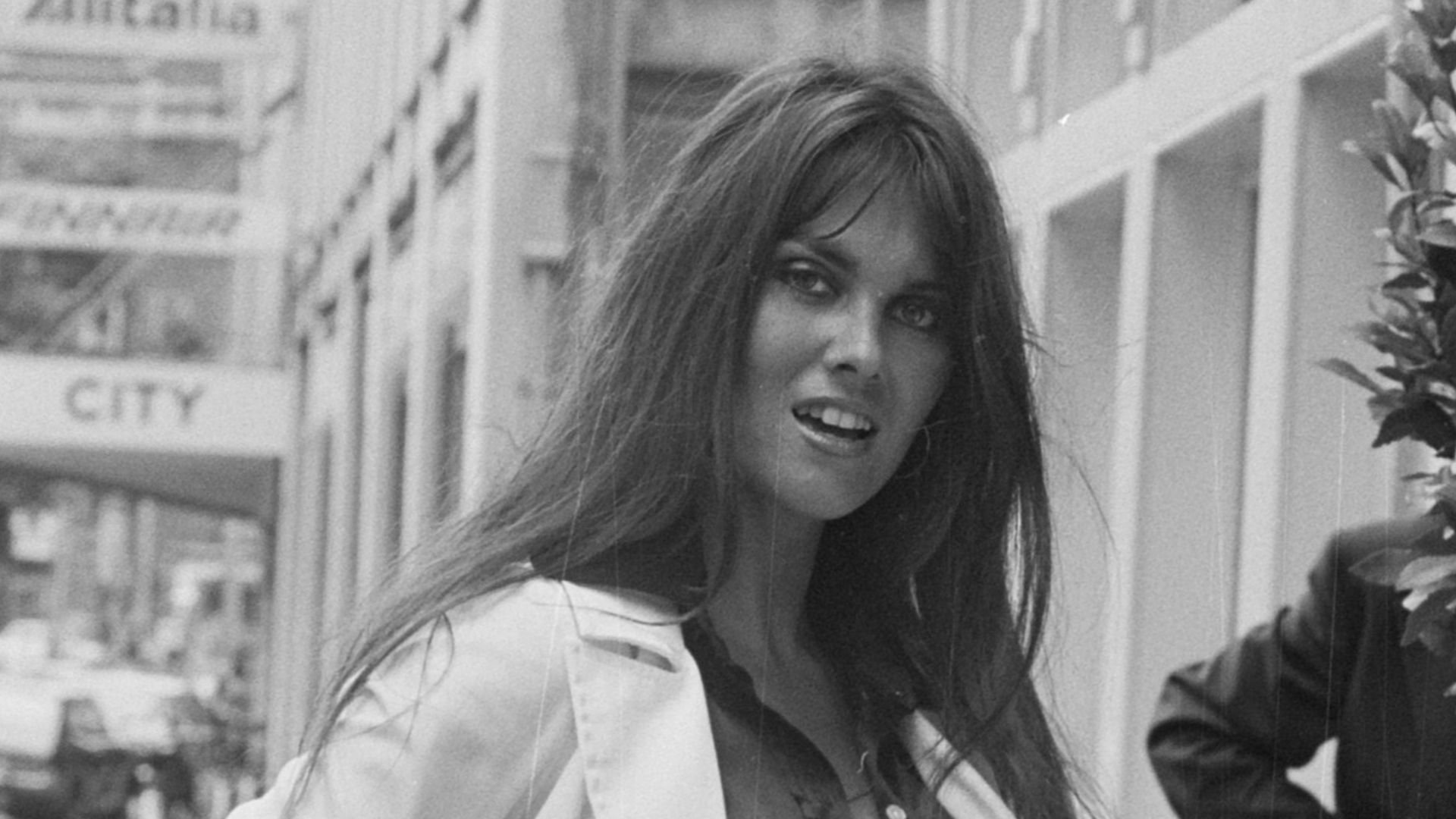 Half length portrait of actress Caroline Munro.