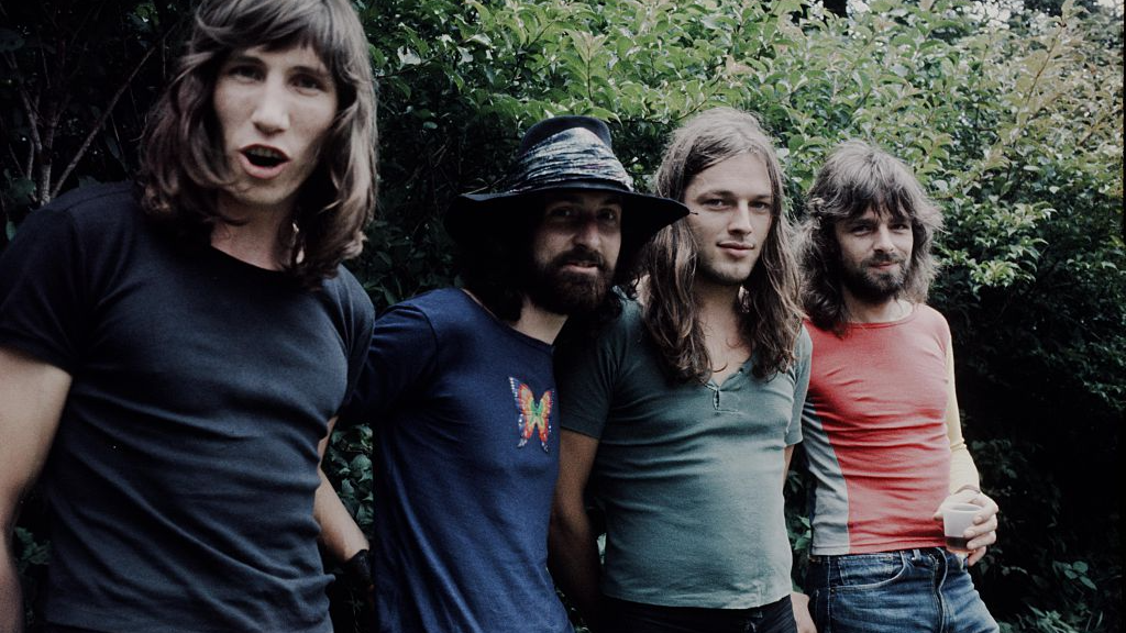 Pink Floyd posing outside