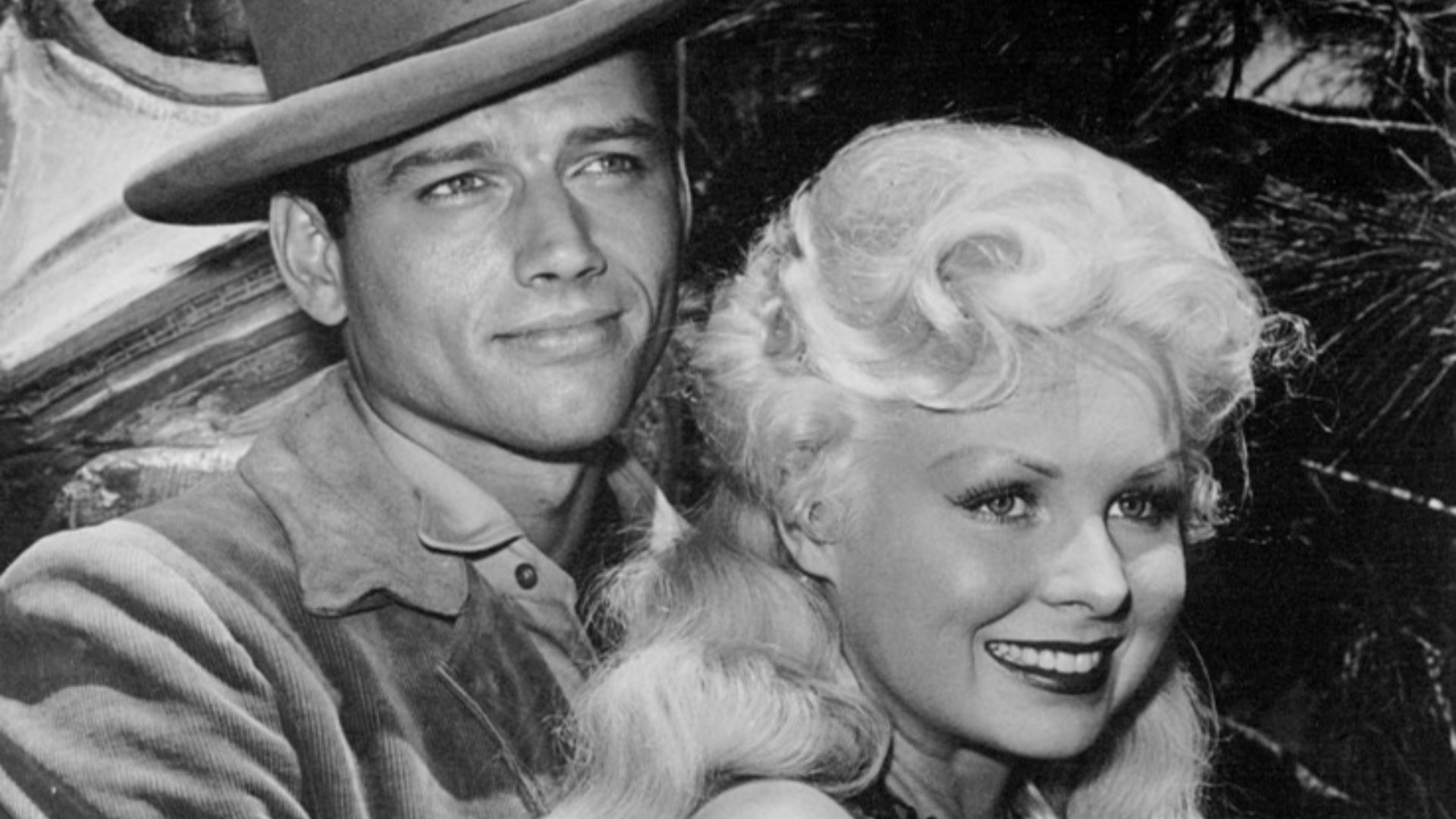 Photo of Ralph Taeger as Mike Halliday and Joi Lansing as Goldie from the television program Klondike.