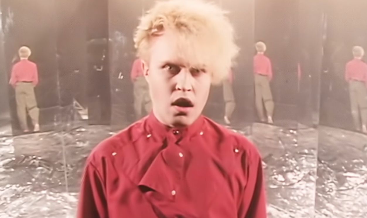 Screenshot from “I Ran (So Far Away)” (1982) 