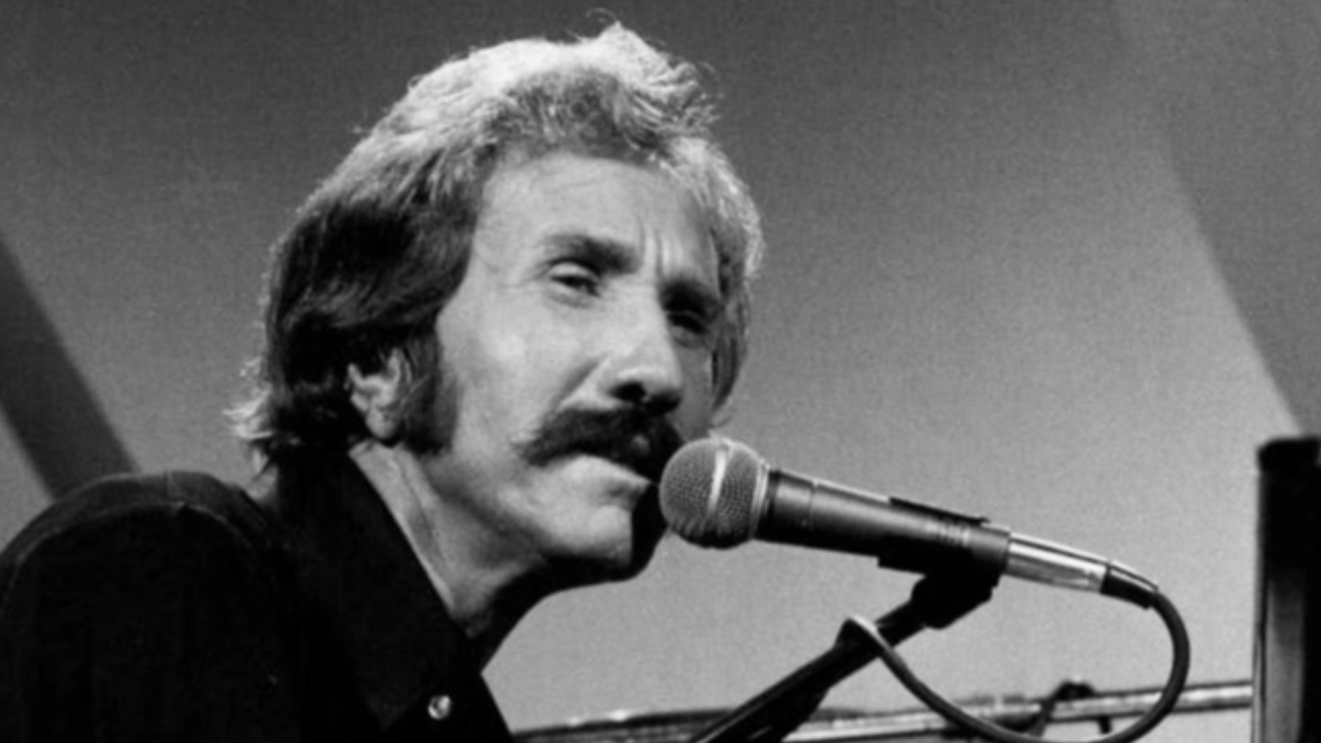 Photo of Marty Robbins performing on the television program The Midnight Special.