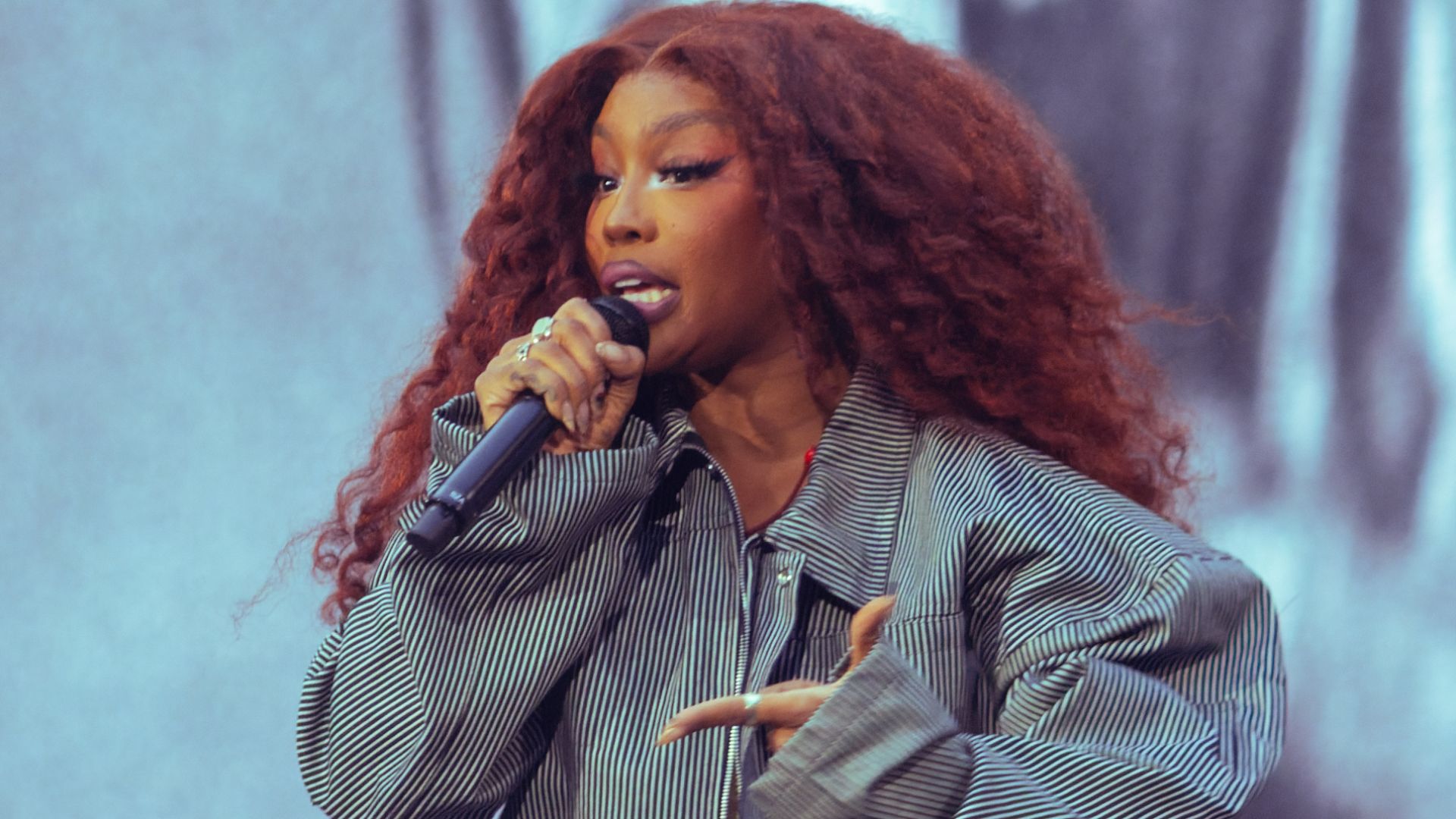 SZA performing at the Grand National Tour