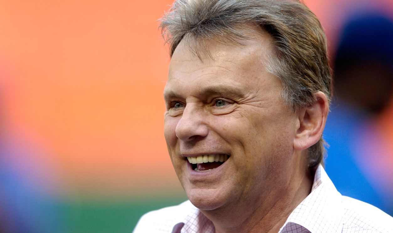 Wheel of Fortune host Pat Sajak on the field before the game between the Los Angeles Dodgers and the Washington Nationals at RFK Stadium May 31, 2007 in Washington, DC.