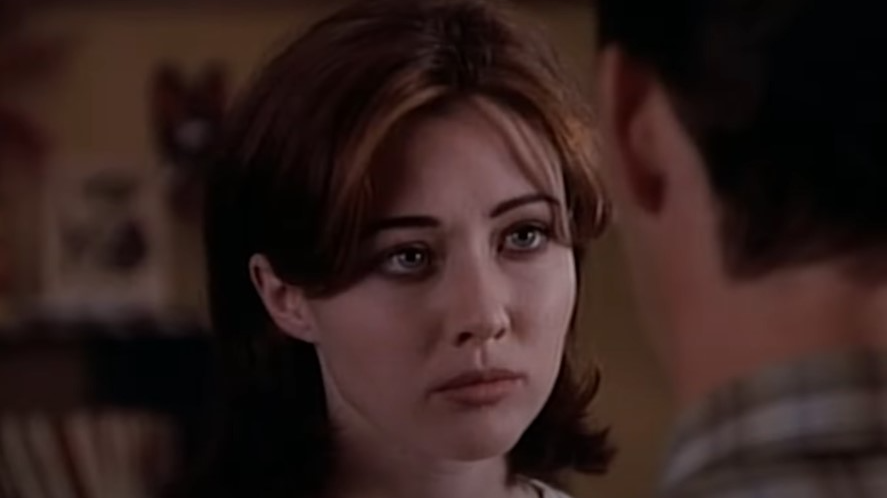 Shannen Doherty as Brenda Walsh in white top