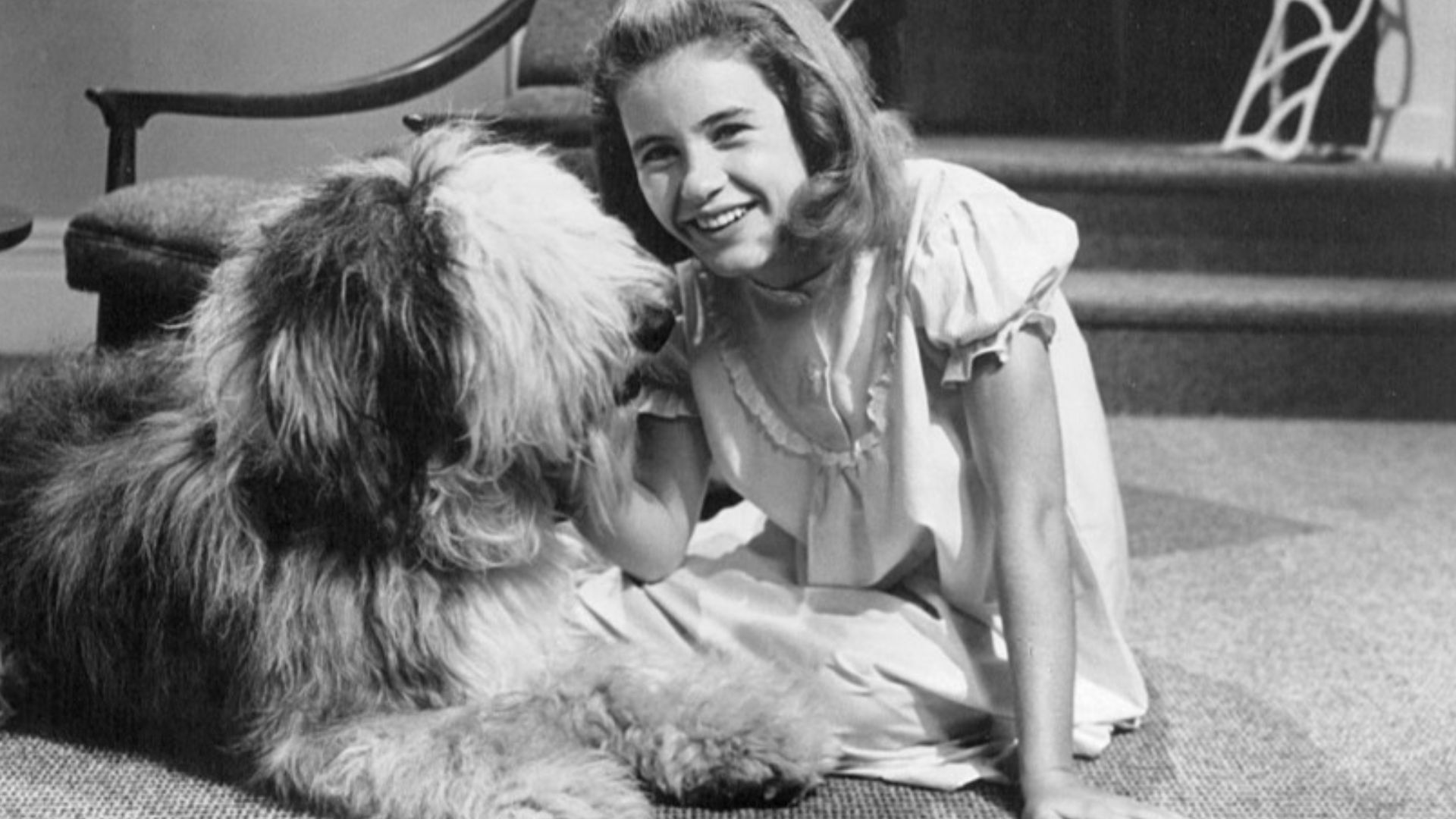 Photo of Patty Duke with the family dog, Tiger, from The Patty Duke Show.