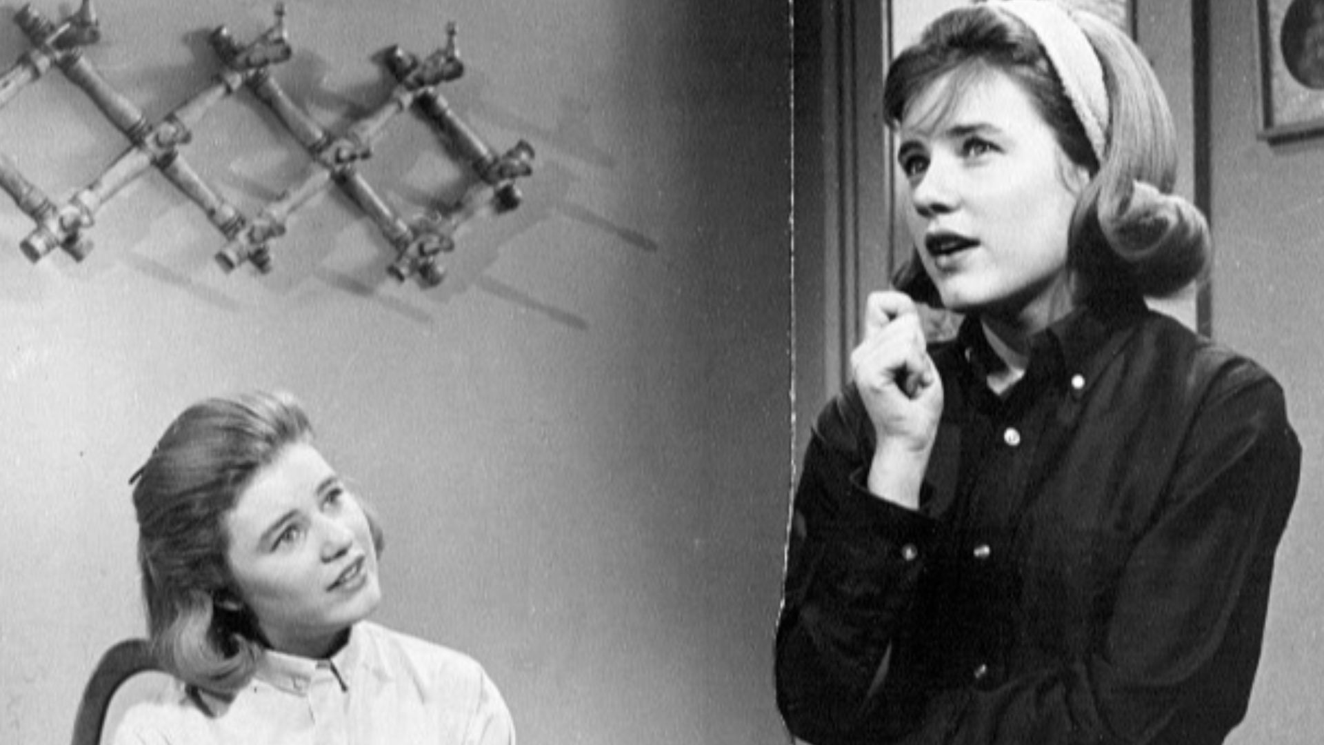 Photo of Patty Duke in a dual role of identical cousins from The Patty Duke Show.