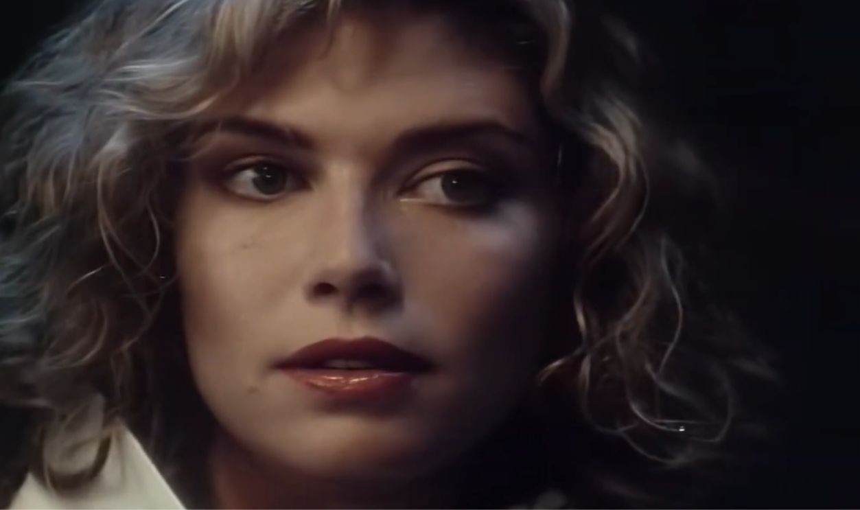 Screenshot from Take My Breath Away, Geffen Records (1986)