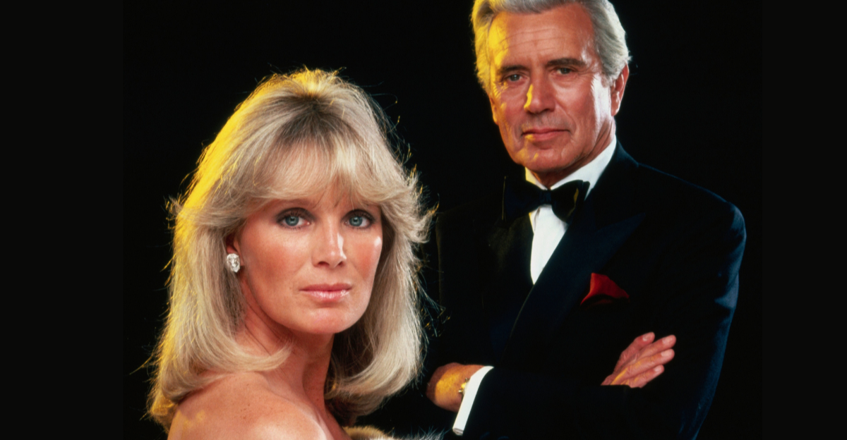 Linda Evans as Krystle Grant Jennings Carrington and John Forsythe as Blake Carrington 