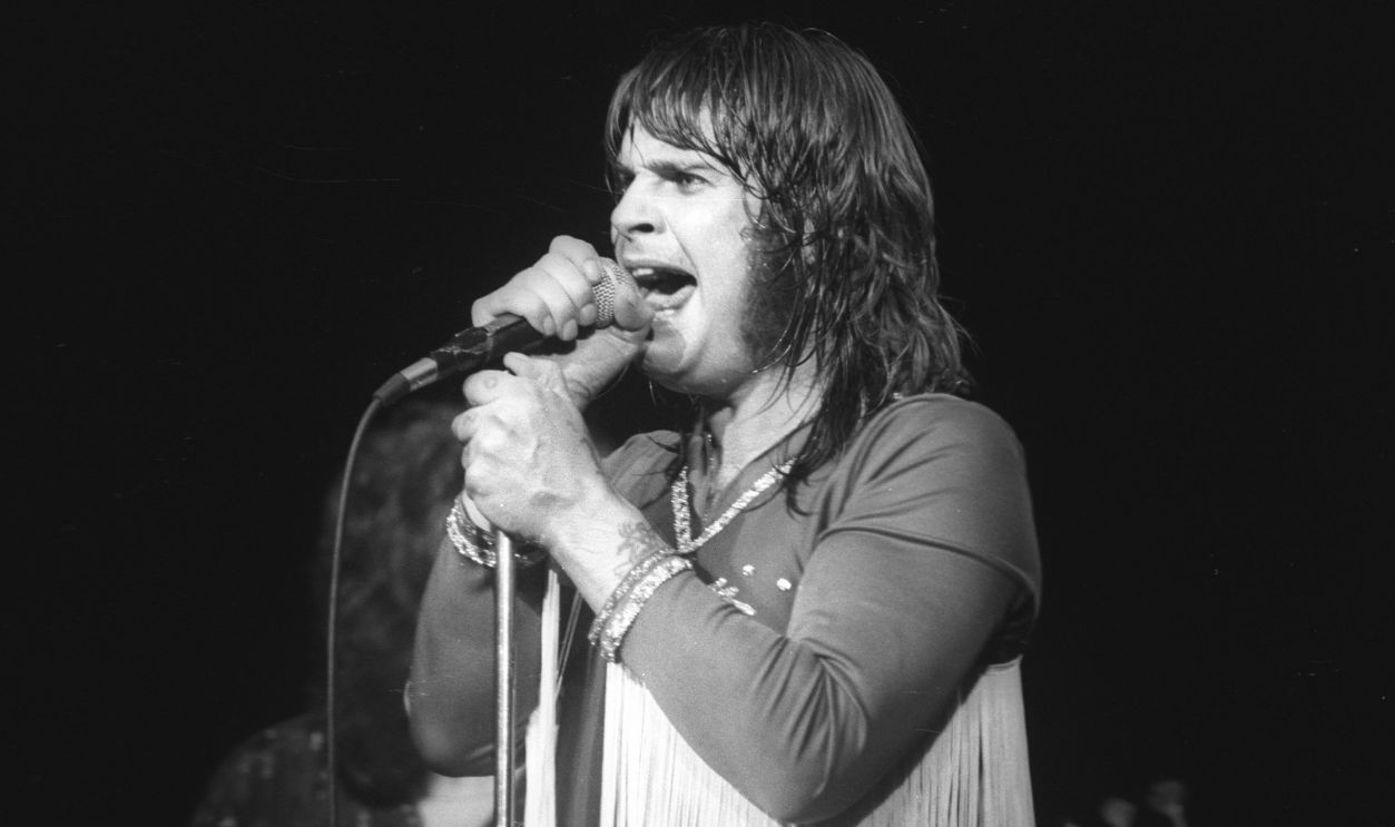  Ozzy Osbourne band performs on stage on the 'Blizzard Of Ozz' tour, United Kingdom, September-October 1980. Ozzy Osbourne (vocals)