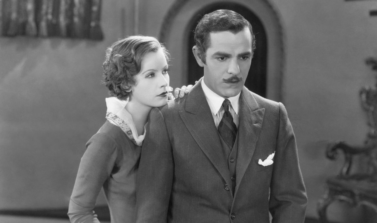 Swedish Actress Greta Garbo (1905-1990) in her second American movie as 'Elena' and Spanish Actor Antonio Moreno (1887-1967) as 'Manuel Robledo' in a scene from the movie 'The 'Temptress', 1926, United States.