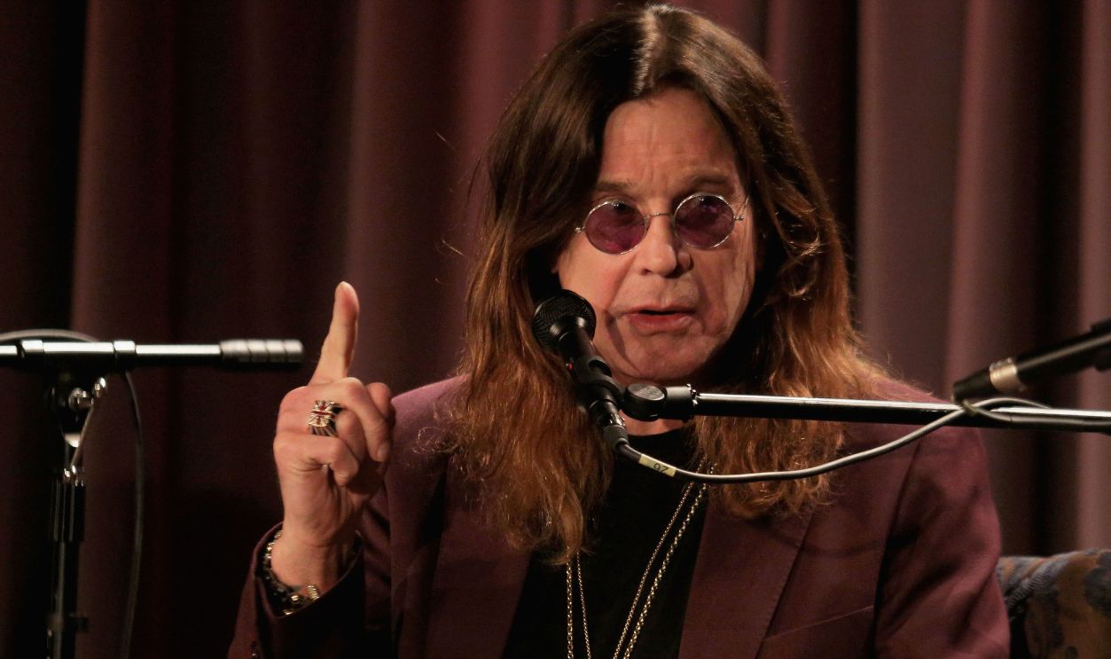Singer Ozzy Osbourne of Black Sabbath speaks onstage during