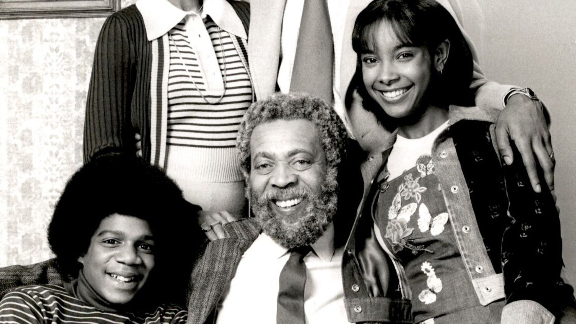 Cast photo of the NBC series Grady in 1975, press release is for the series premiere on December 1975.
From left to right:

Top: Carol Cole, Joe Morton  Bottom: Haywood Nelson, Whitman Mayo, Rosanne Katon.