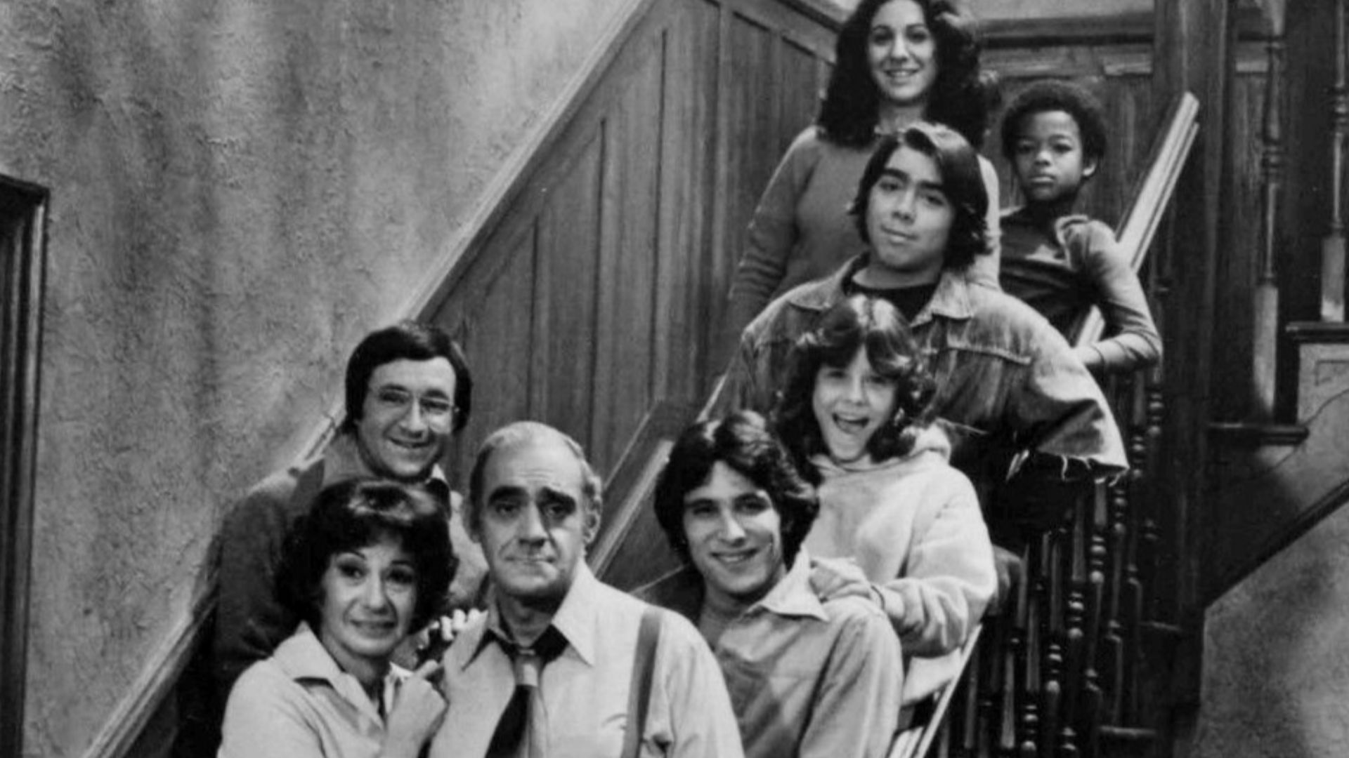 Cast photo from the television comedy Fish.  From top: Sarah Natoli, Todd Bridges, John Cassisi, Denise Miller, Lenny Barry, Barry Gordon, Florence Stanley, Abe Vigoda.