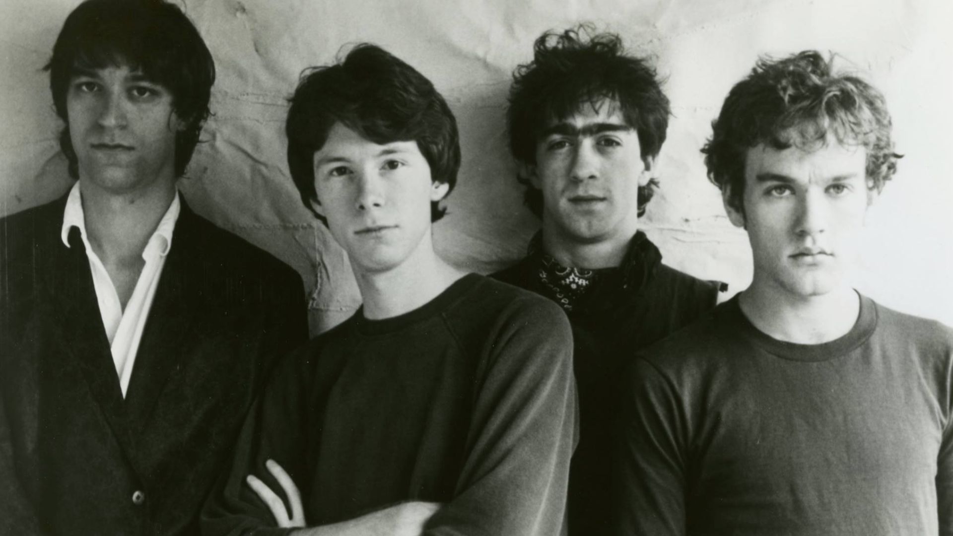 Press photo of the band R.E.M. dated to 1983. No copyright markings on the photo and no registration for it could be found on the US Copyright Registry (other photos of R.E.M. by Lee-Phipps were registered, but not this specific one)