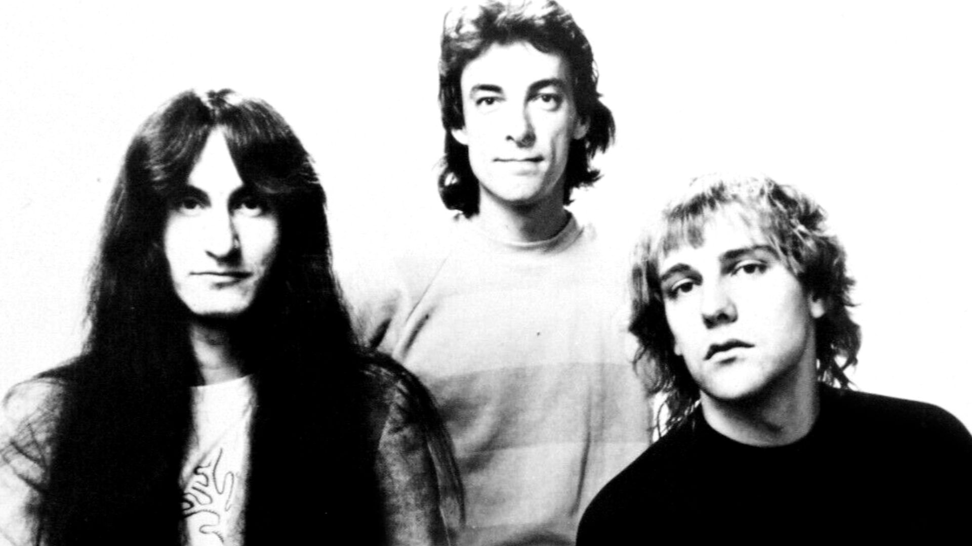 Promotional press photo of Canadian rock band Rush.