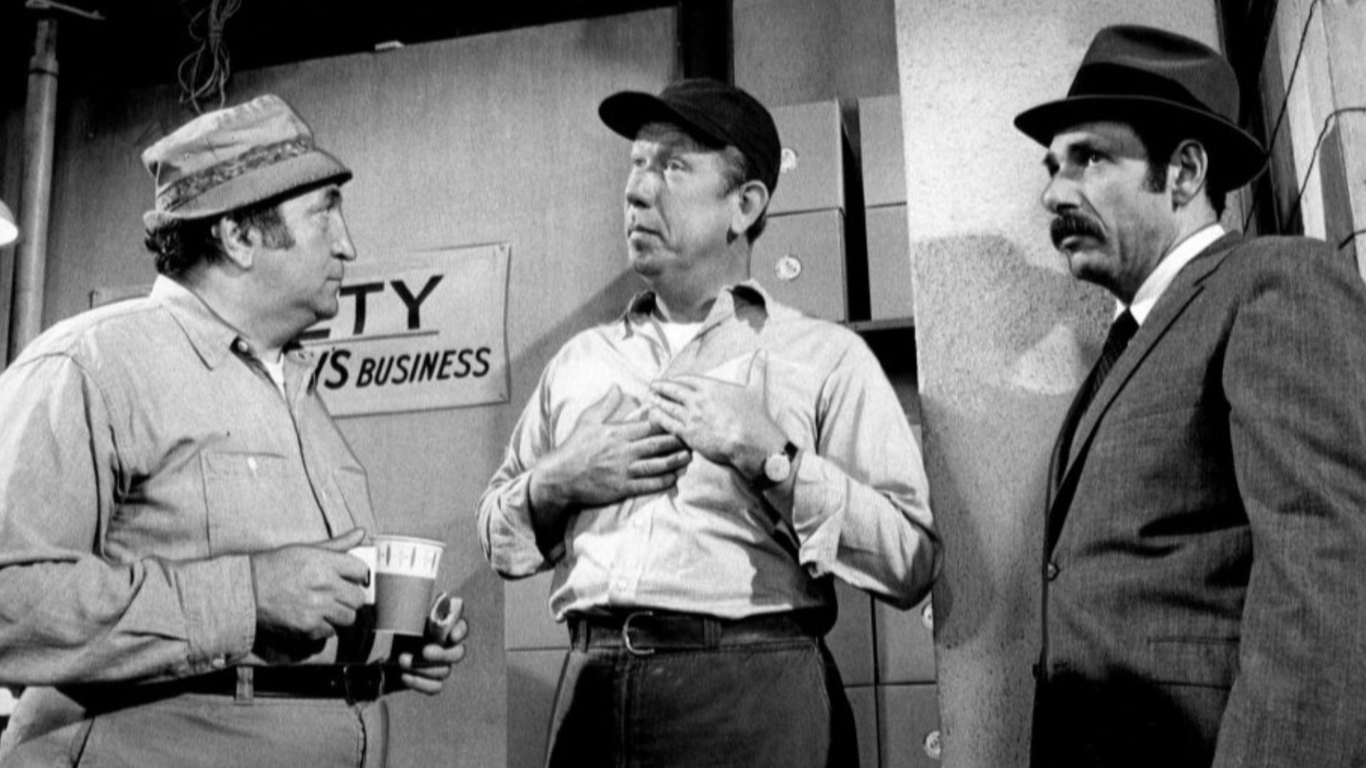 Factory scene from the television program Arnie.  From left: Tom Pedi, Allan Melvin and Herschel Bernardi as Arnie Nuvo, a former factory worker who received an executive position at the plant.