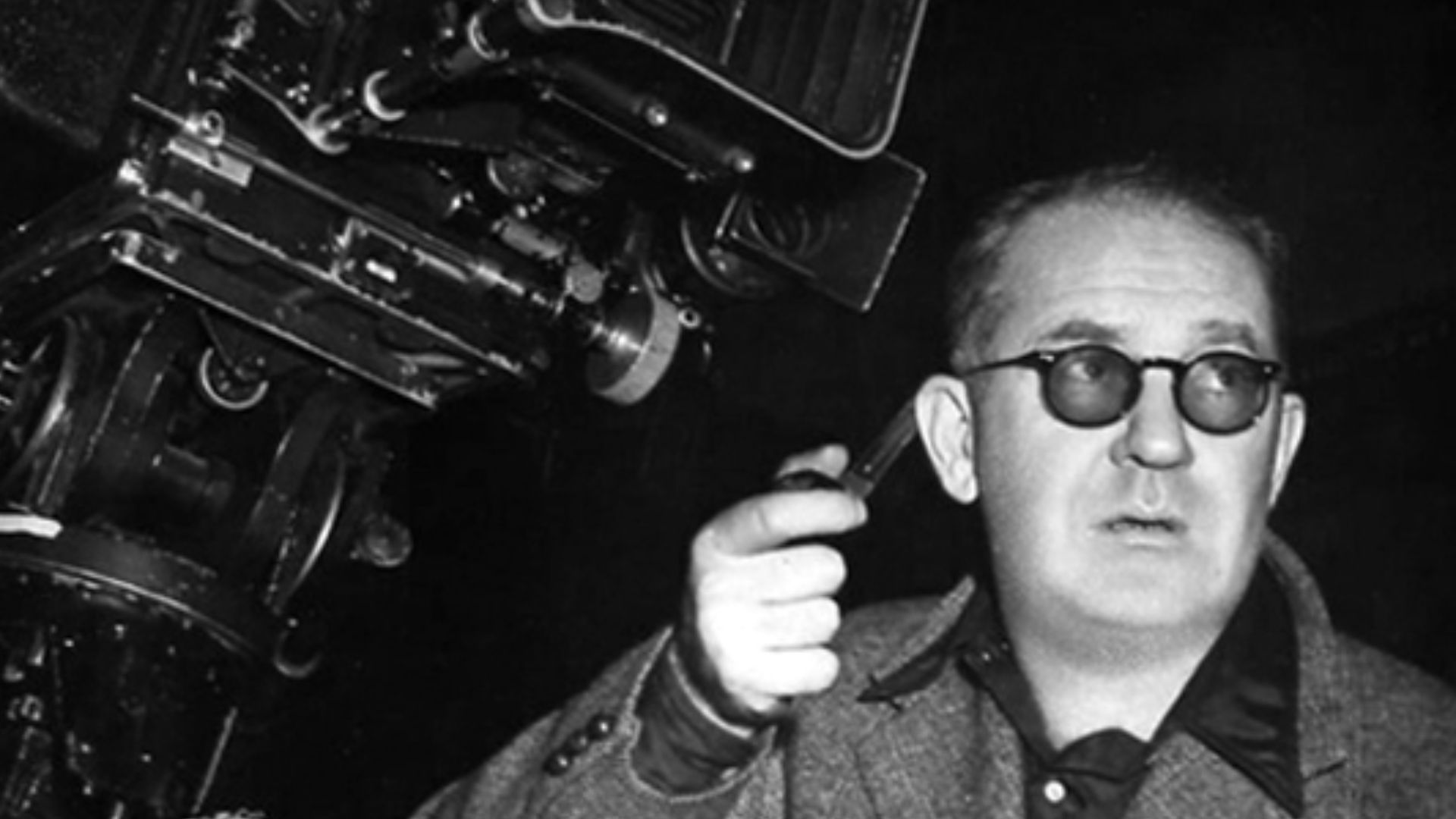 Bert Glennon (cinematographer, left) & John Ford (director) on the set of Stagecoach - publicity still