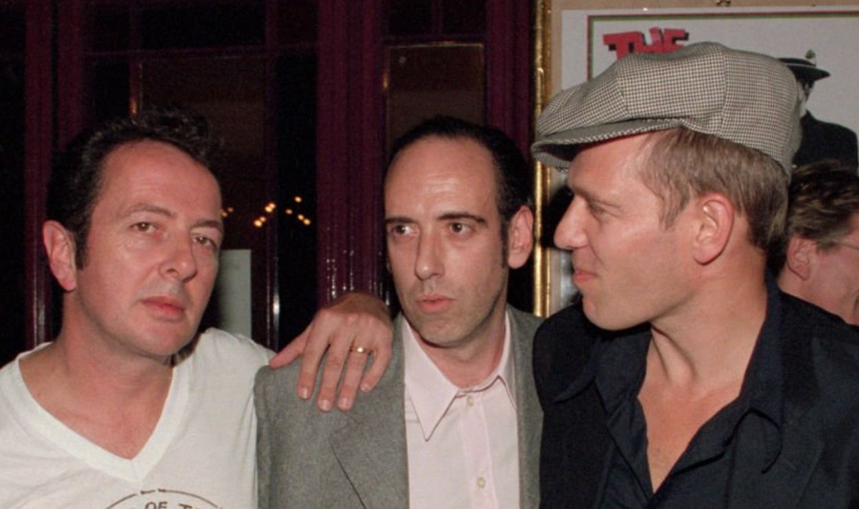 The Clash arriving at the screening of their documentary 'Westway to the world'. Directed by Don Letts. At the Coronet cinema, Nottinghill Gate, London, 21st September 2000.