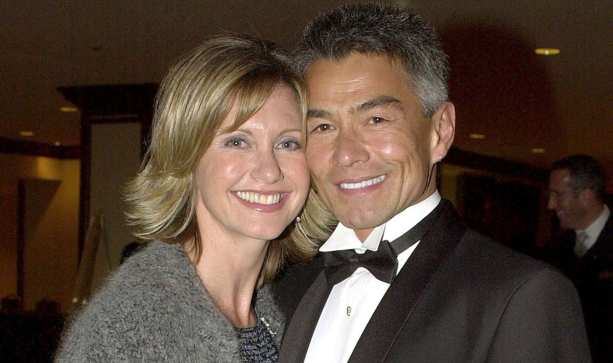 Actress Olivia Newton-John poses with her boyfriend Patrick McDermott at the 10th Annual Human Rights Campaign Gala, February 17, 2001 in Los Angeles, CA
