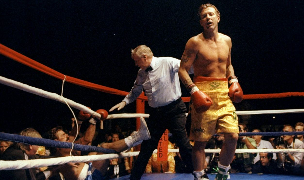GettyImages - 1788026 - Mickey Rourke (right) walks away as the referee helps Rourke''s opponent Steve Powell out of the tangled ropes.