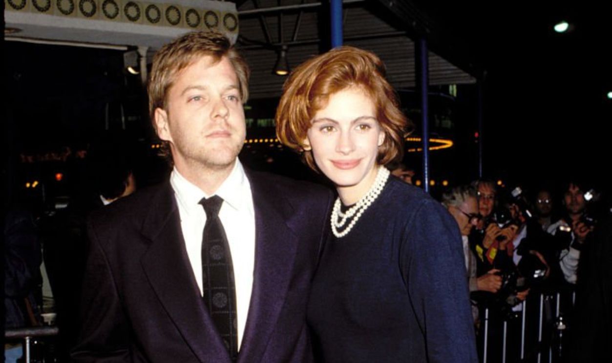 UNITED STATES - CIRCA 1991: Julia Roberts and Keifer Sutherland attending movie premiere in LA 1991