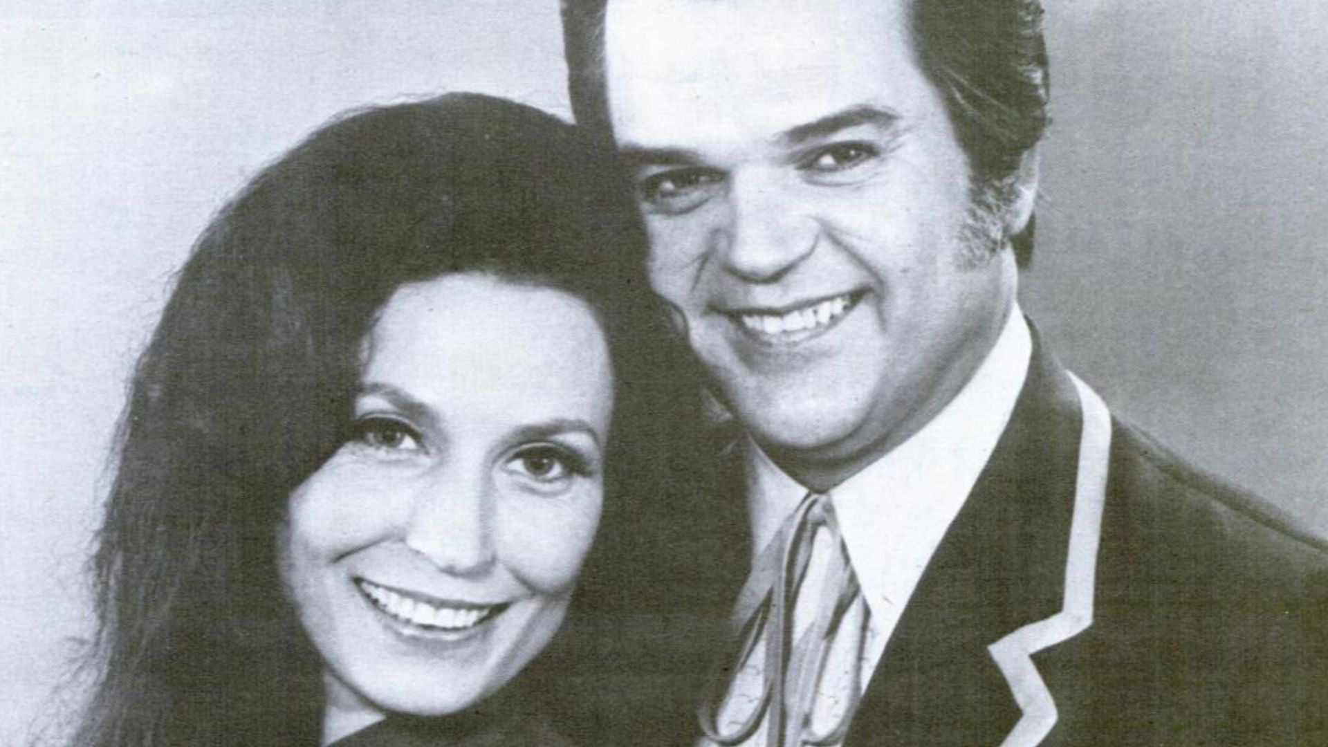 Trade ad for Loretta Lynn and Conway Twitty's album Country Partners .To better adapt it to his respective Wikipedia article, the ad was cropped and cleaned in a graphics editing program. The original can be viewed at the source below.