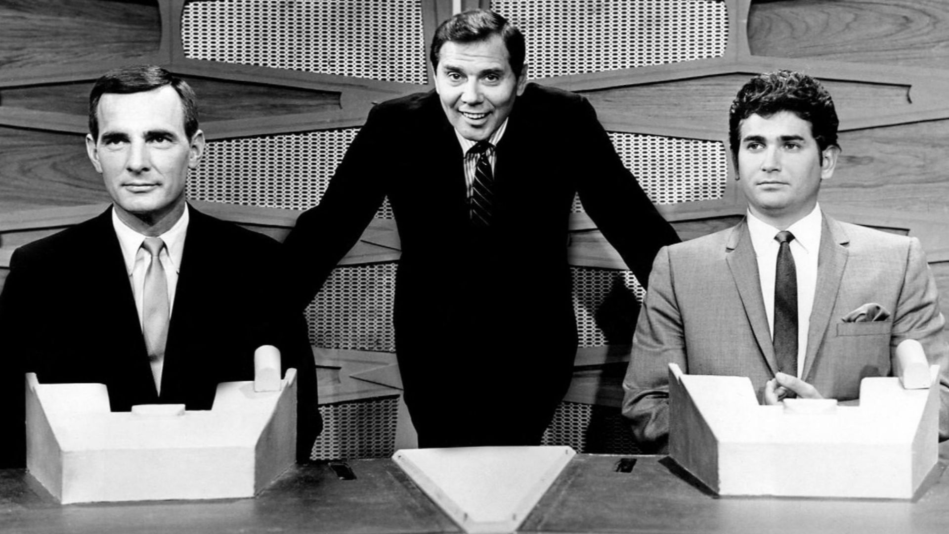 Photo of Gene Rayburn with Dennis Weaver and Michael Landon as celebrity team captains for a special edition of the television game program The Match Game.