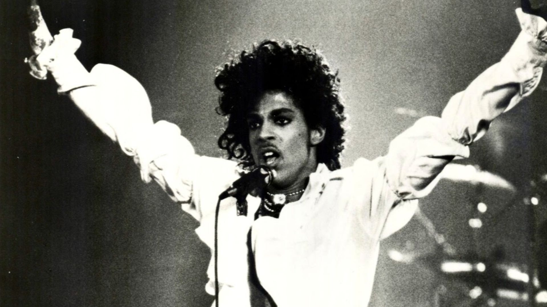 The American musician Prince in a press photo dated to 1984. No copyright markings on the photo and no registration for this photo could be found in the US Copyright Registry.