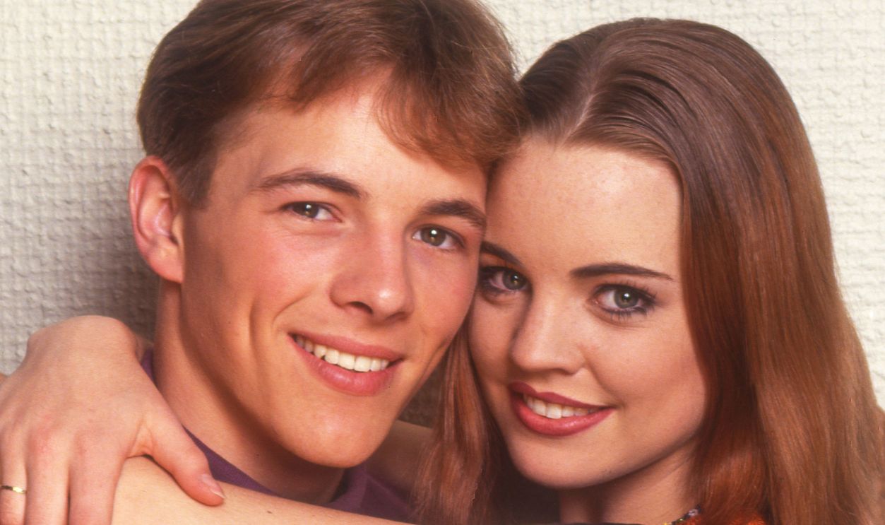 Portrait of Australian actors Dieter Brummer (1976 - 2021) and Melissa George, mid 1990s.