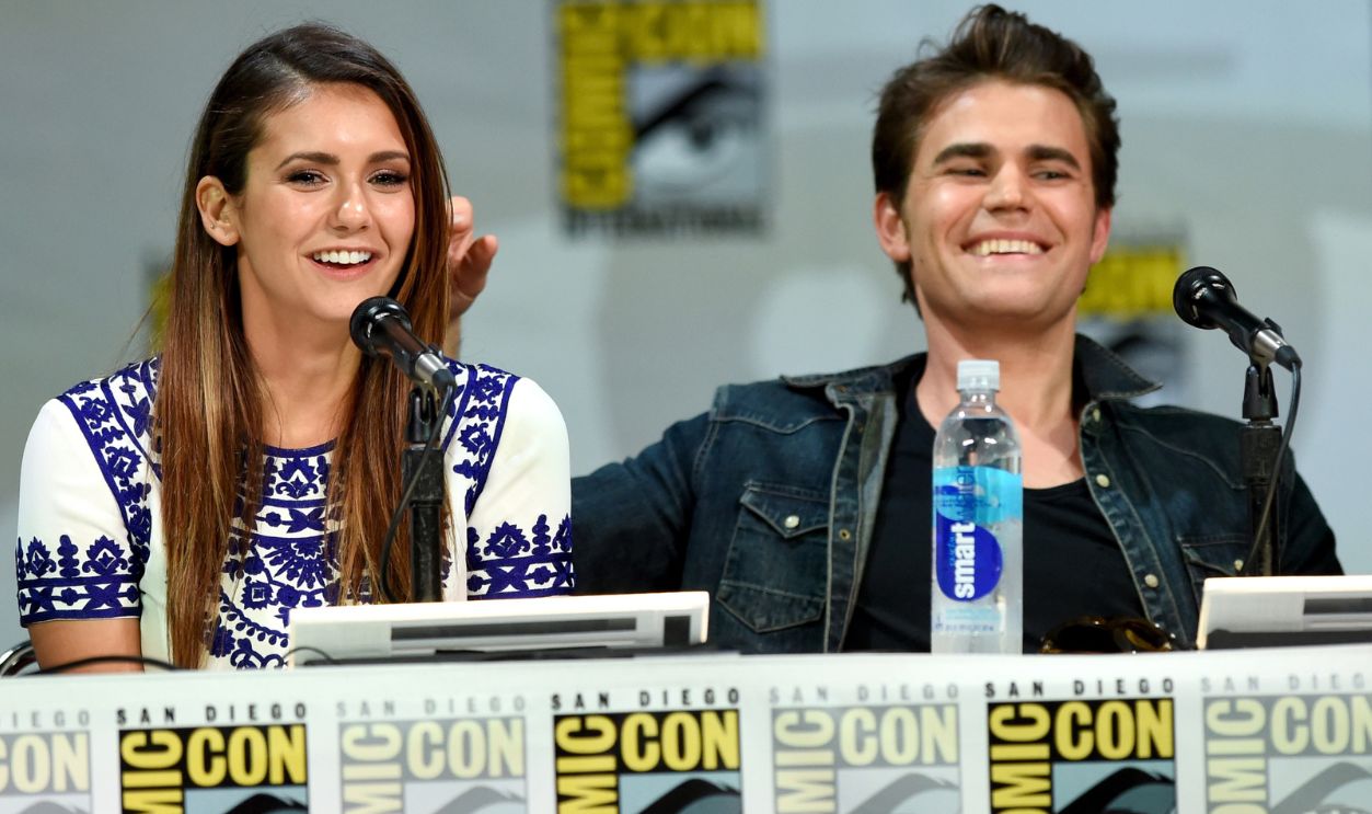 SAN DIEGO, CA - JULY 26: Actors Nina Dobrev (L) and Paul Wesley attend CW's "The Vampire Diaries" panel during Comic-Con International 2014 at the San Diego Convention Center on July 26, 2014 in San Diego, California.