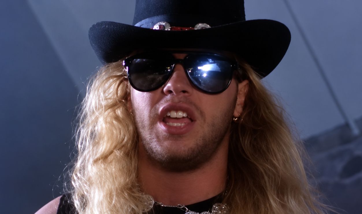 Screenshot from Every Rose Has Its Thorn (1988)