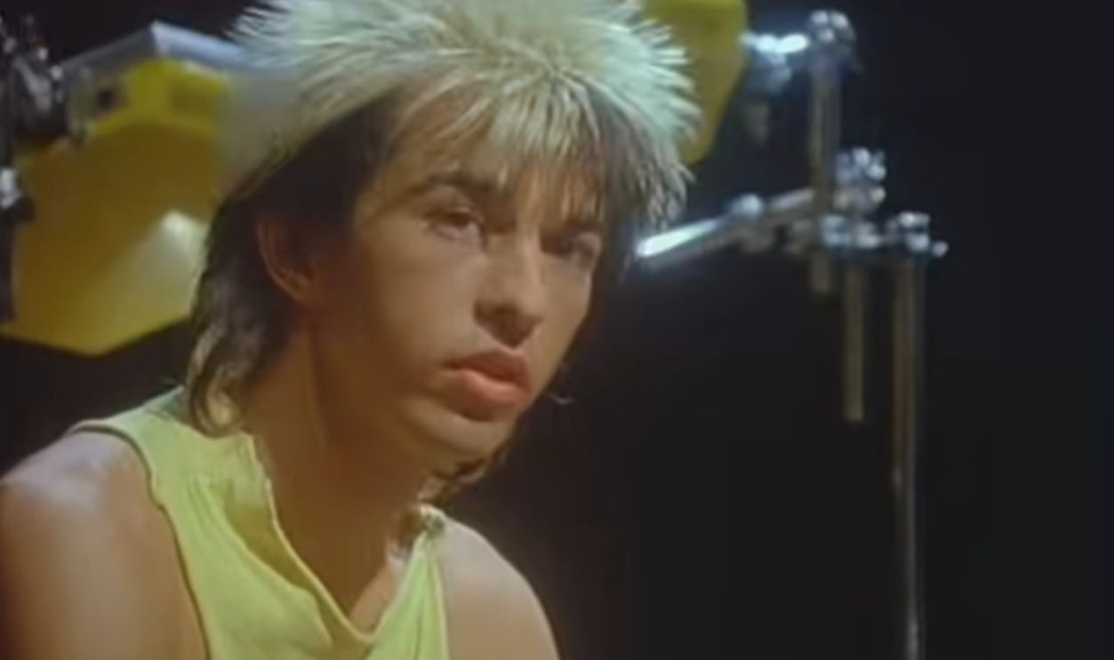 Screenshot from Too Shy (1983)