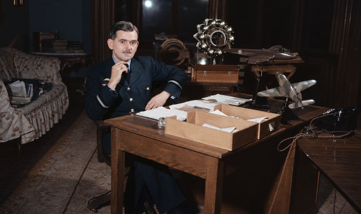 Air Commodore Sir Frank Whittle, 'father of the jet engine', at his desk.